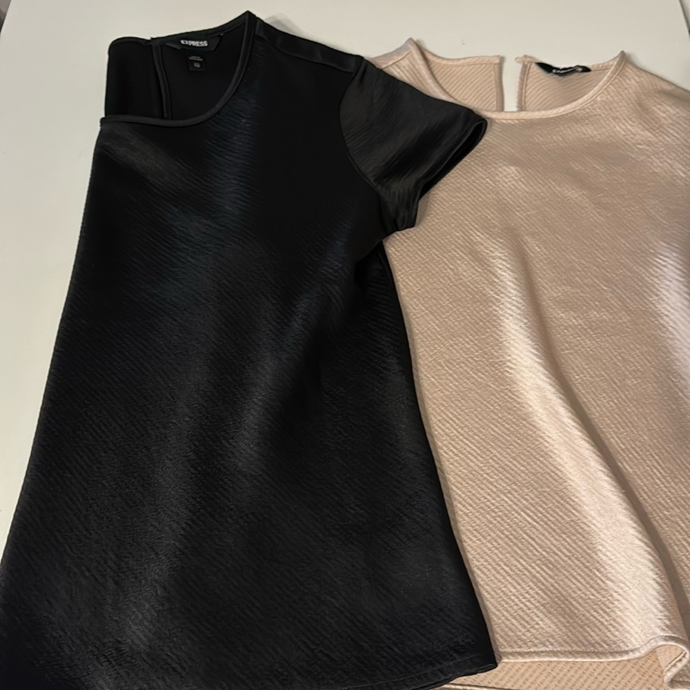 2 Express X small short sleeve shirts. No tags but brand new!